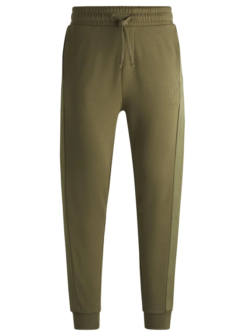 HUGO Cotton-terry tracksuit bottoms with logo tape