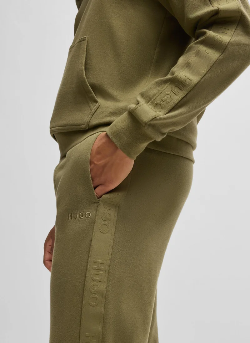 HUGO Cotton-terry tracksuit bottoms with logo tape