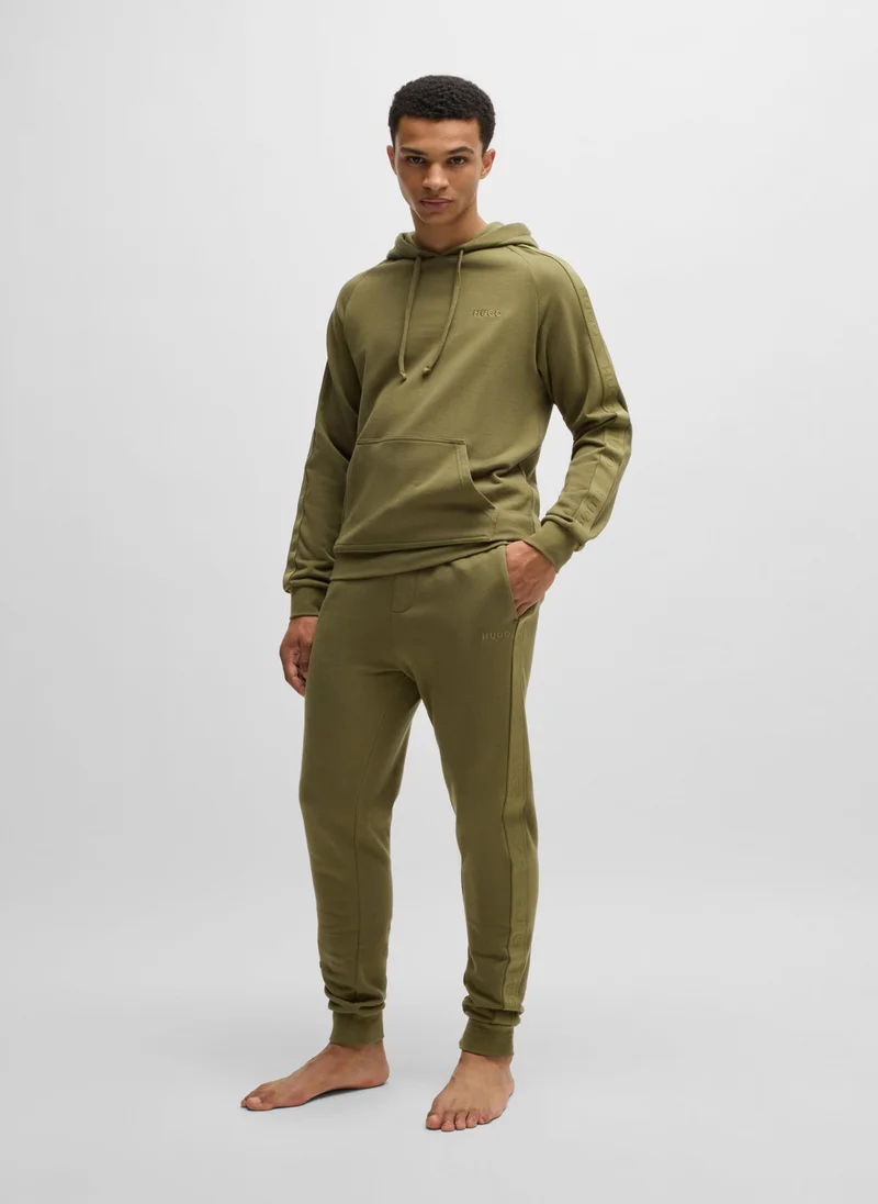 HUGO Cotton-terry tracksuit bottoms with logo tape