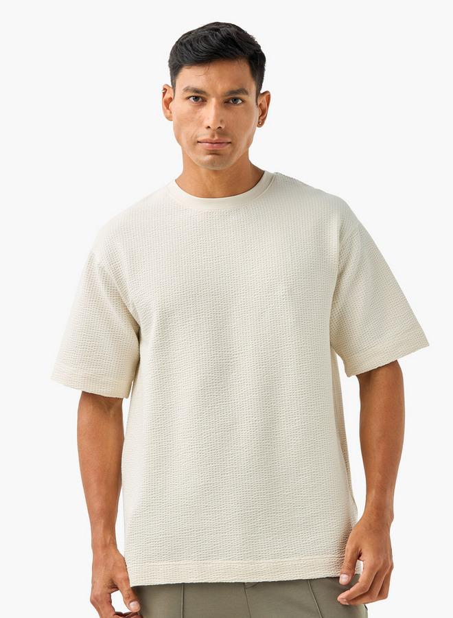 ايكونيك تيشيرت بأكمام قصيرة وياقة دائرية بنقشة الوافل الأيقونية - Image 1