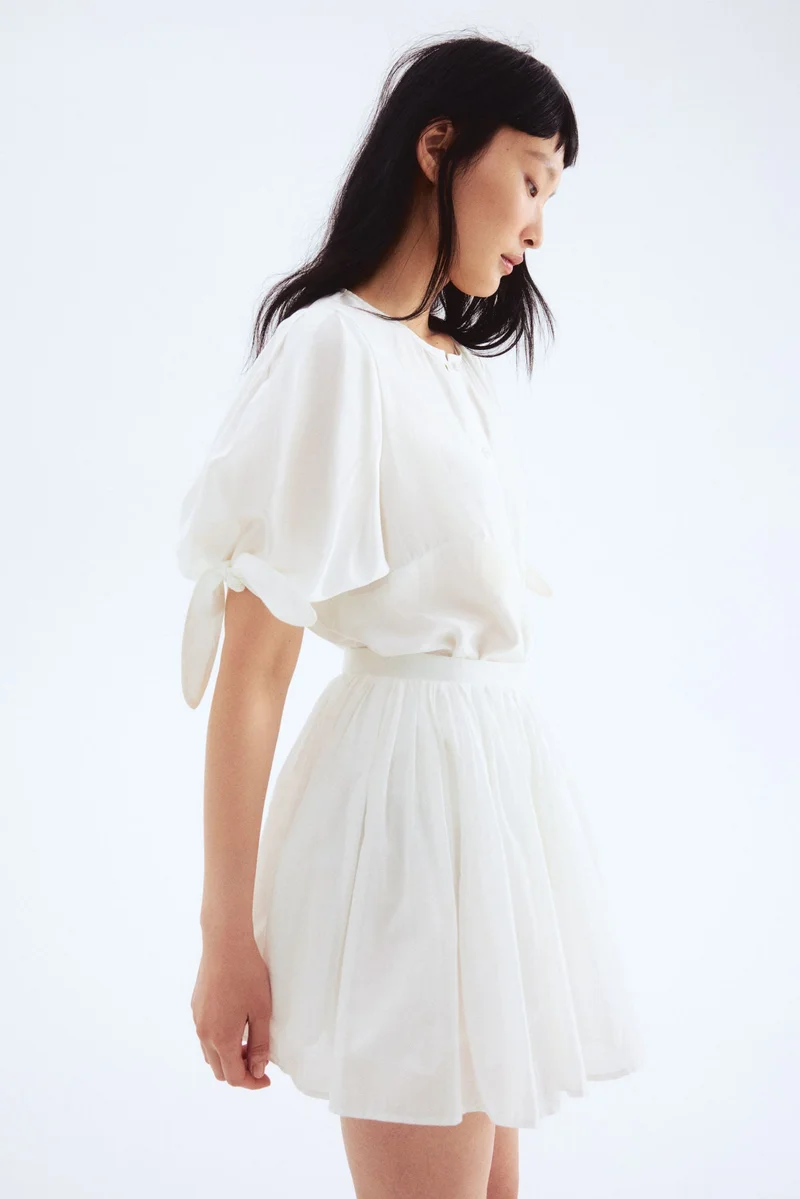 اتش اند ام بلوزة بأكمام منفوخة