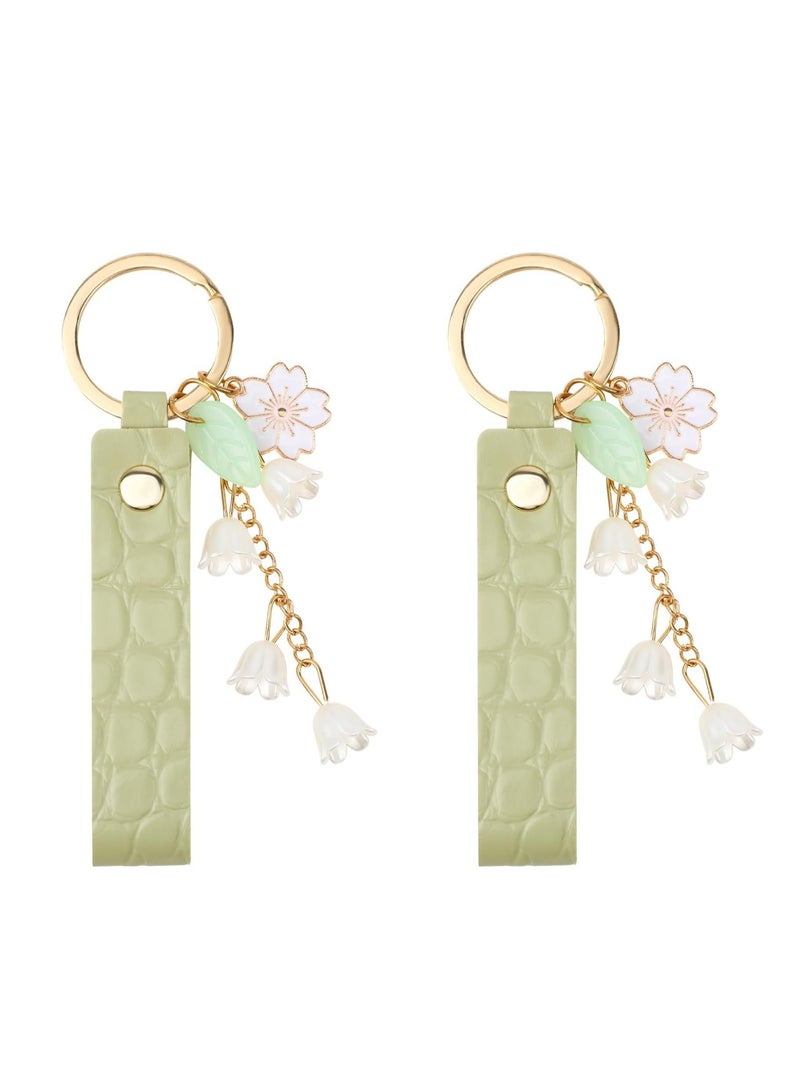 أوزيغالور 2 قطعة سلاسل مفاتيح جلدية من زنبق الوادي، سلاسل مفاتيح جلدية من زنبق الوادي، حلقات مفاتيح من زهرة الجرس السحلبية للنساء والفتيات، إكسسوارات لطيفة لحقائب اليد. - Image 1