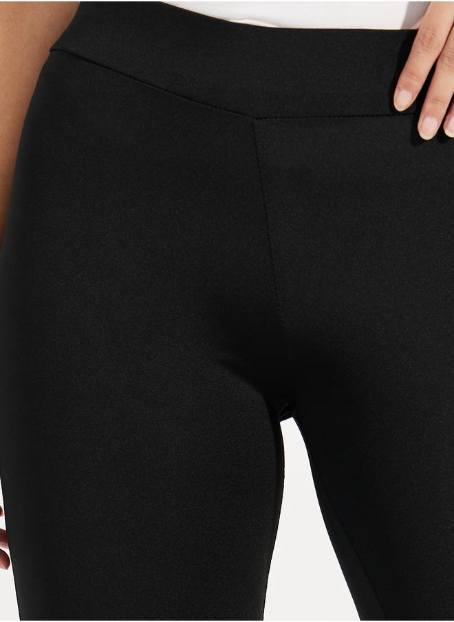 Solid Elastic Waistband Flared Leggings - pzsku/ZE855E531E5FC0C2CEE28Z/45/_/1721993469/edad6fc5-6016-496f-ac2b-7881af4a118e