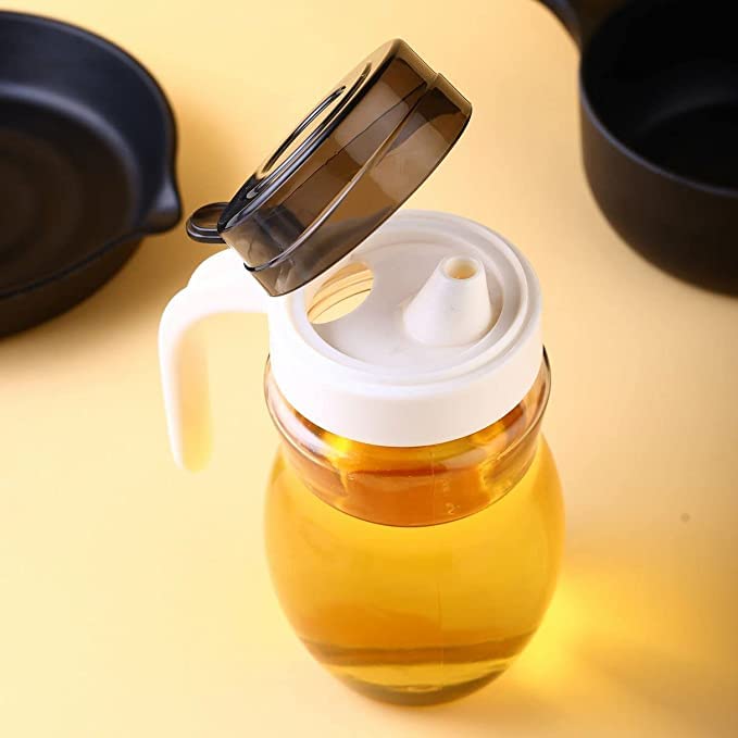 Yorten ABS Plastic Oil Dispenser Bottle for Kitchen Leakage Proof Storage Air Tight Plastic Modular Bottle with Handle and Kitchen Tools 650 ml Plastic with G Handle - Image 1