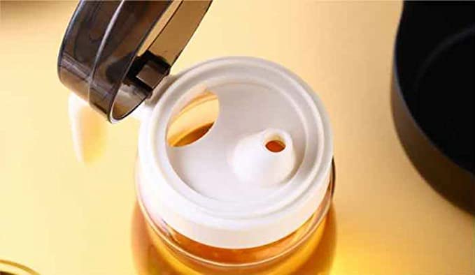 Yorten ABS Plastic Oil Dispenser Bottle for Kitchen Leakage Proof Storage Air Tight Plastic Modular Bottle with Handle and Kitchen Tools 650 ml Plastic with G Handle - Image 3