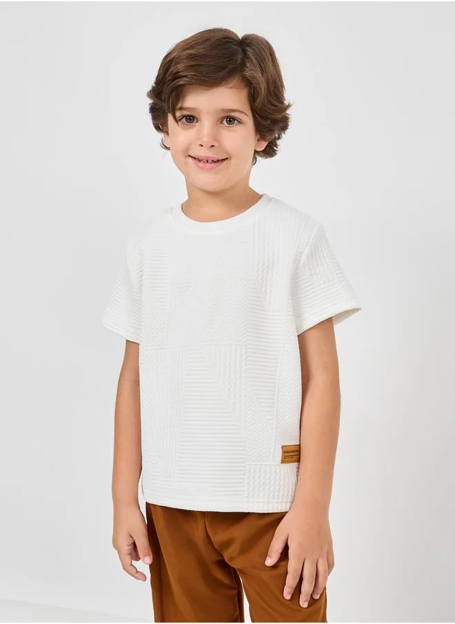 ستايلي Styli Patch Detail Textured T-shirt and Relaxed Fit Pant Set