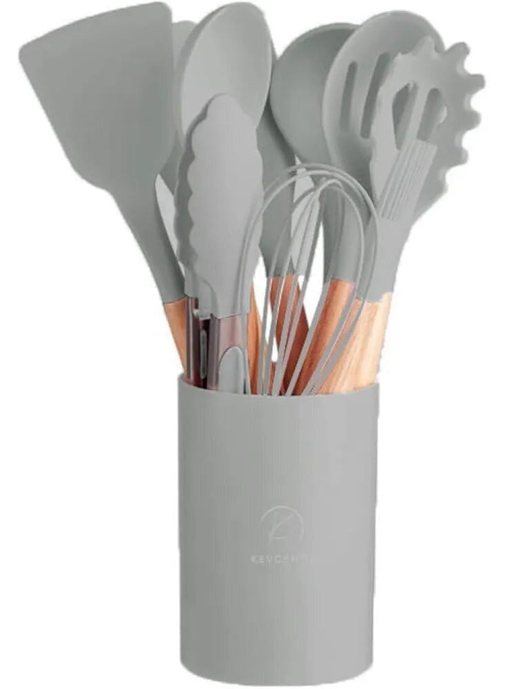 طقم توزيع سيليكون بيد خشب مع حامل – 12 قطعة - Image 2