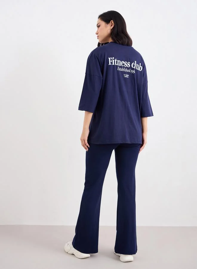 Styli Styli Patch Detail Oversized T-Shirt and Flared Leggings Co-Ords