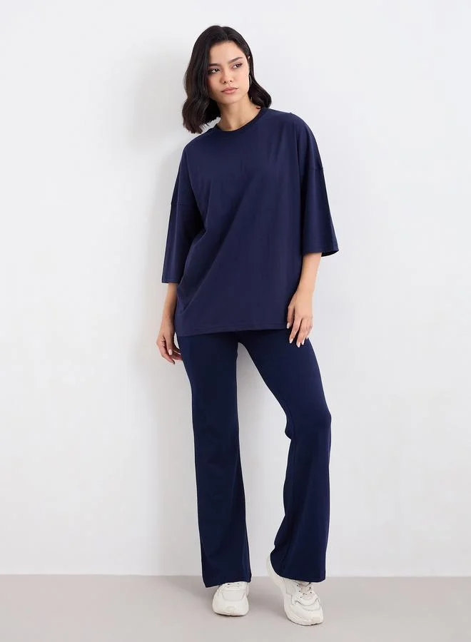 ستايلي Styli Patch Detail Oversized T-Shirt and Flared Leggings Co-Ords