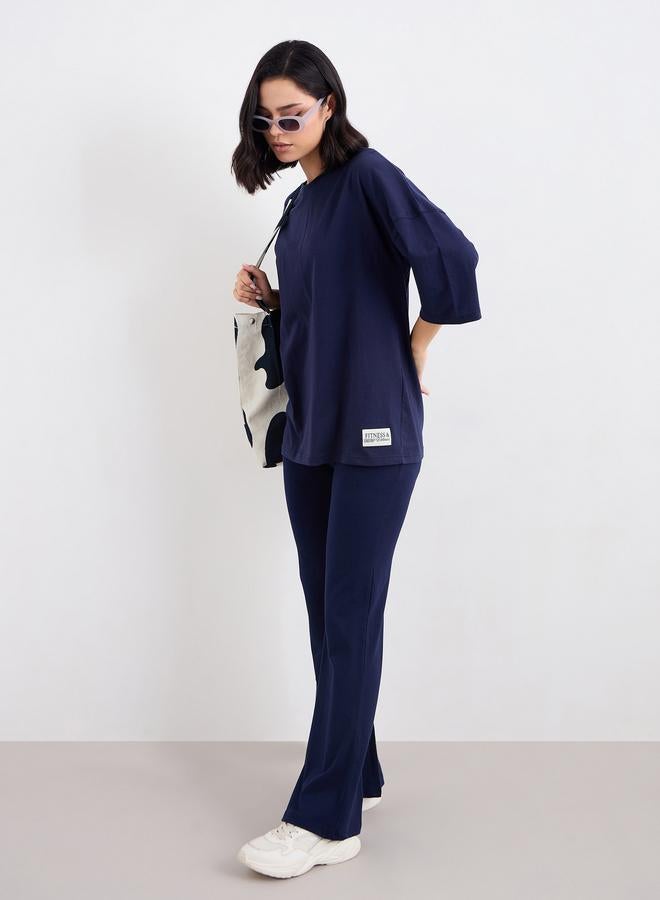 Styli Patch Detail Oversized T-Shirt and Flared Leggings Co-Ords - Image 1