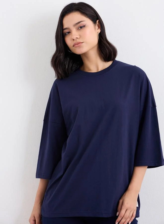 Styli Styli Patch Detail Oversized T-Shirt and Flared Leggings Co-Ords