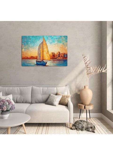 Sailboat on the water in front of an orange and blue sky with clouds