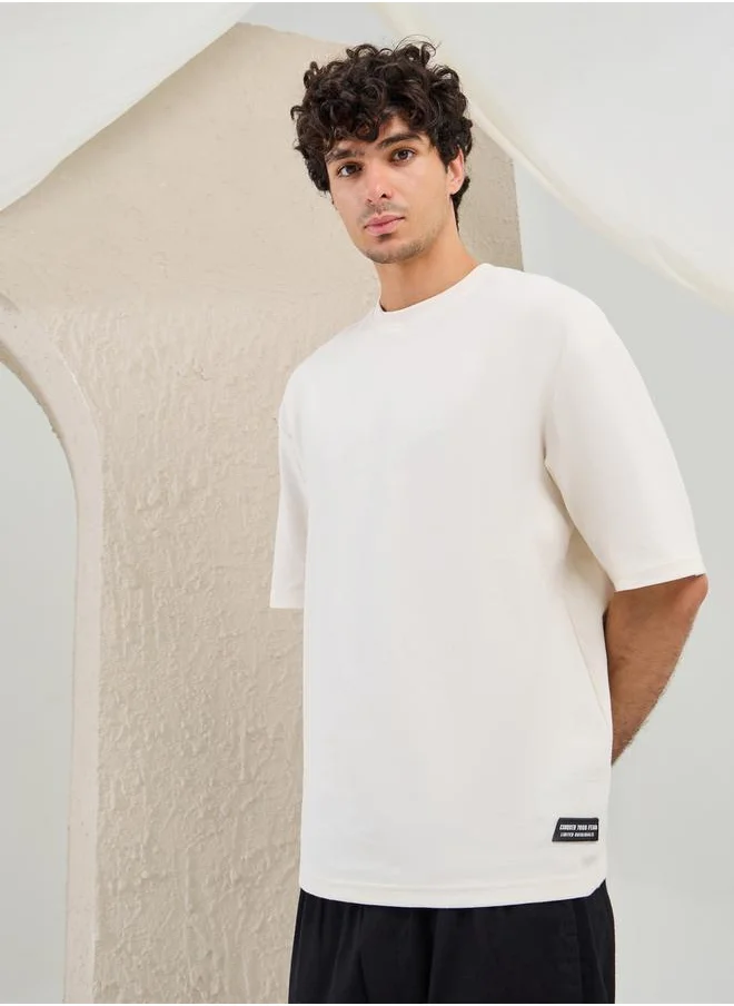 Styli Solid Badge Detail Oversized T-Shirt