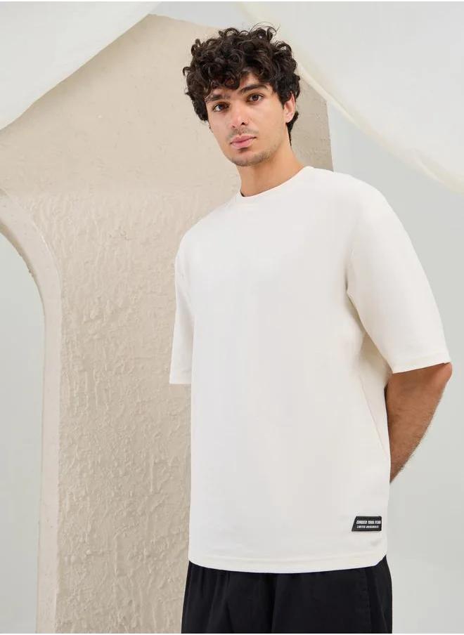 ستايلي Styli Solid Badge Detail Oversized T-Shirt