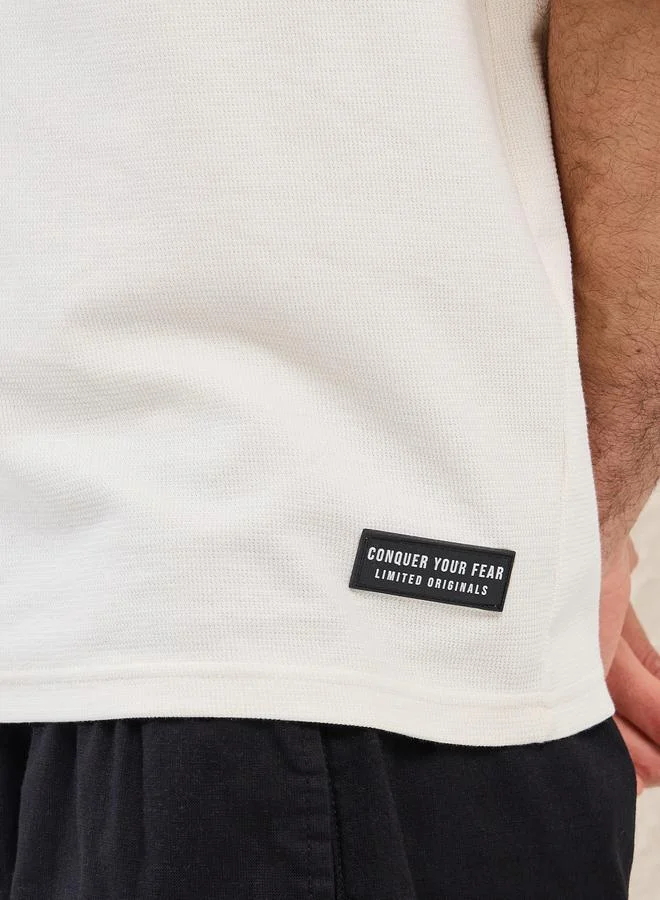 Styli Styli Solid Badge Detail Oversized T-Shirt
