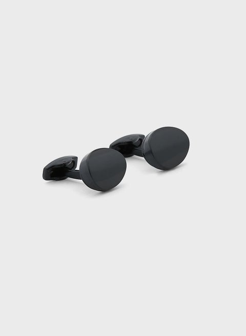 ازرار اساور اكمام في علبة هدية