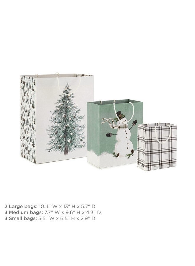 هولمارك تشكيلة حقائب هدايا عيد الميلاد من هولمارك (8 حقائب: 3 حقائب صغيرة 6 بوصات، 3 حقائب متوسطة 9 بوصات، 2 حقائب كبيرة 13 بوصة) باللونين الأبيض والأخضر الفاتح مع رجل ثلج ريفي، وشجرة دائمة الخضرة لعيد الميلاد، وحفلات الزفاف الشتوية، وأعياد الميلاد - Image 2