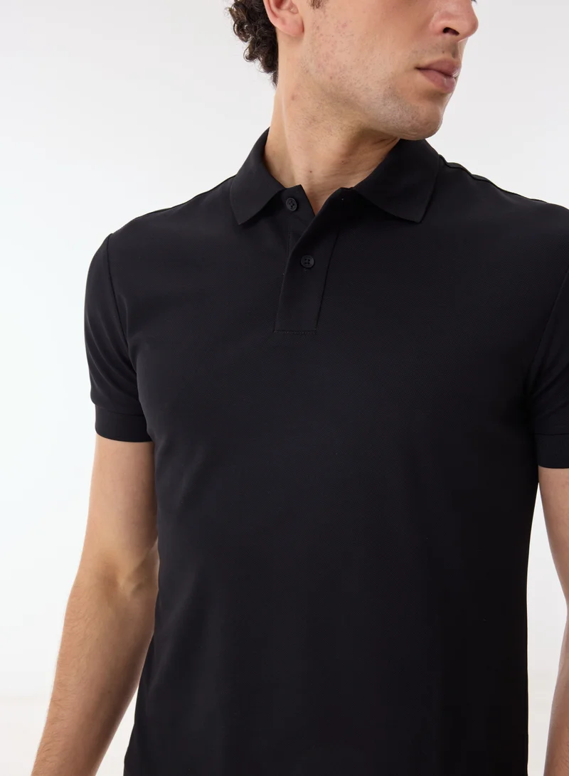 Ashita Fernandes  Alistair Men’s Black Poly Cotton T-Shirt – Body-Fitted Half Sleeve Slip-On Lightweight Evening Wear for Men | Best Price UAE