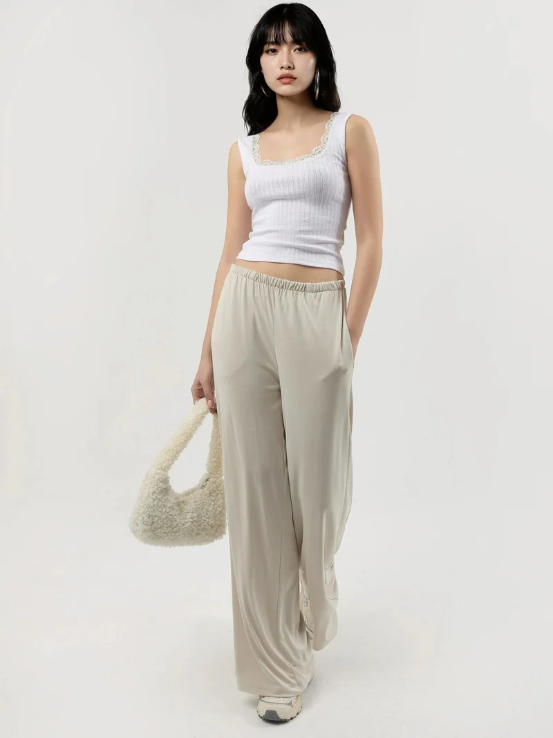 بوسيم بلوزة بدون أكمام بياقة على شكل حرف  وتفاصيل دانتيل من