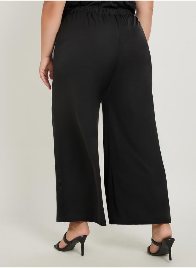 Styli Styli Plus Size Solid Elasticated Waistband Wide Leg Pants  - Image 4