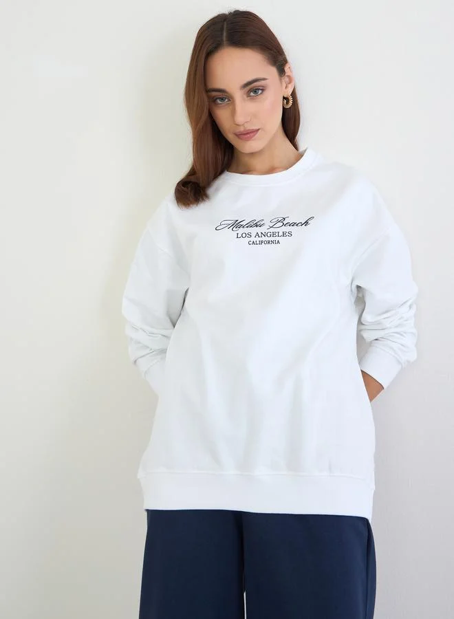 Styli Styli Printed Longline Sweatshirt and Wide Leg Joggers Co-Ords