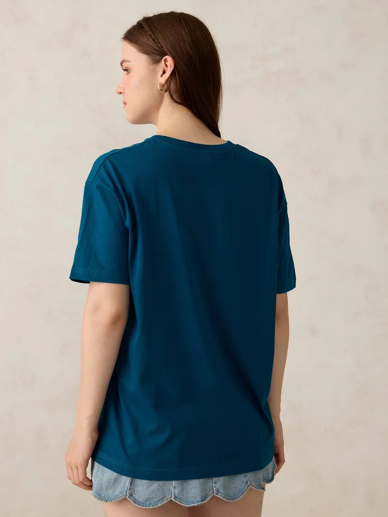 أوجيدر تيشيرت فضفاض سادة بياقة على شكل حرف  بلون تركواز