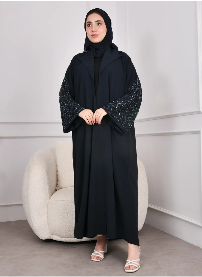 HAWRAA ABAYA Quarter-cloche abaya with collar and wide sleeves decorated with embroidery