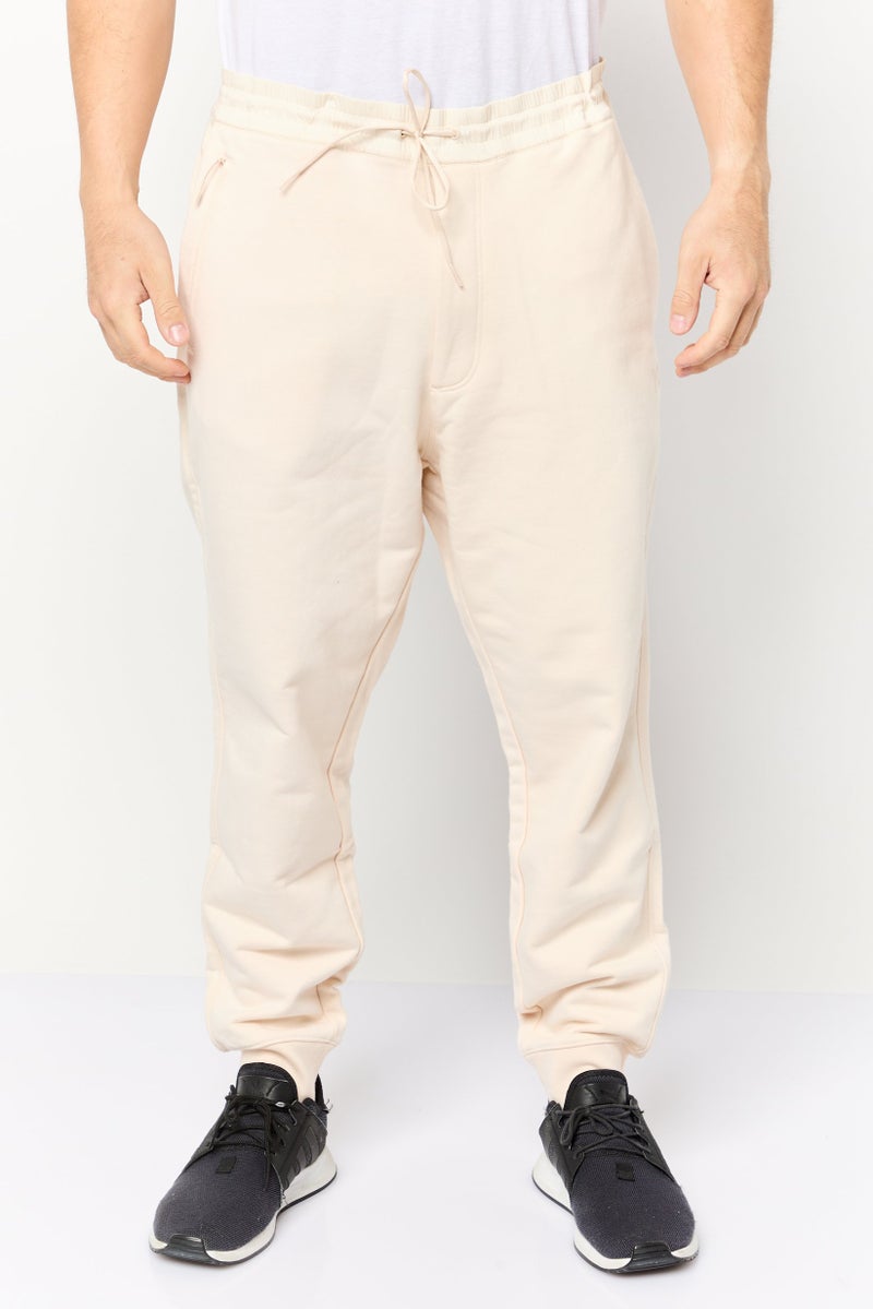 Adidas Men Sportswear Fit Outdoor Sweatpants, Cream - Image 1