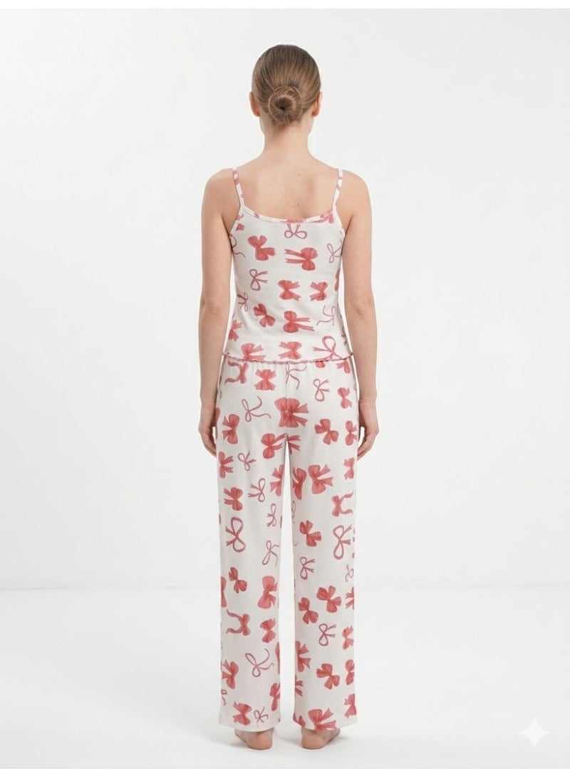 Caesar Women's derby pajama set top and pants with a bow pattern - Image 3