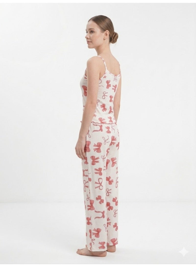 Caesar Women's derby pajama set top and pants with a bow pattern - Image 2
