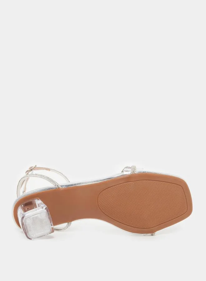 Take Two Embellished Bow Transparent Block Heel Sandals by Styli