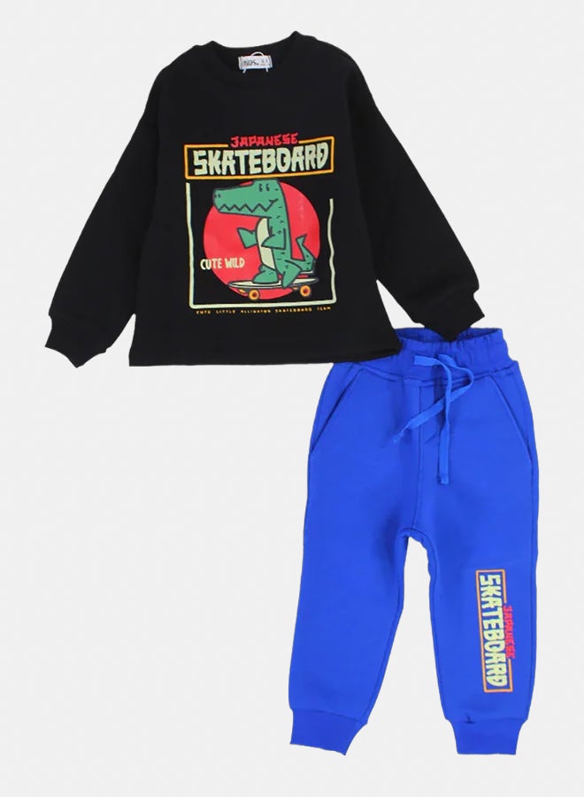 اوركيدز طقم بيجامة قطن للأولاد – أسود/أزرق بطباعة ديناصور على لوح تزلج - Image 1