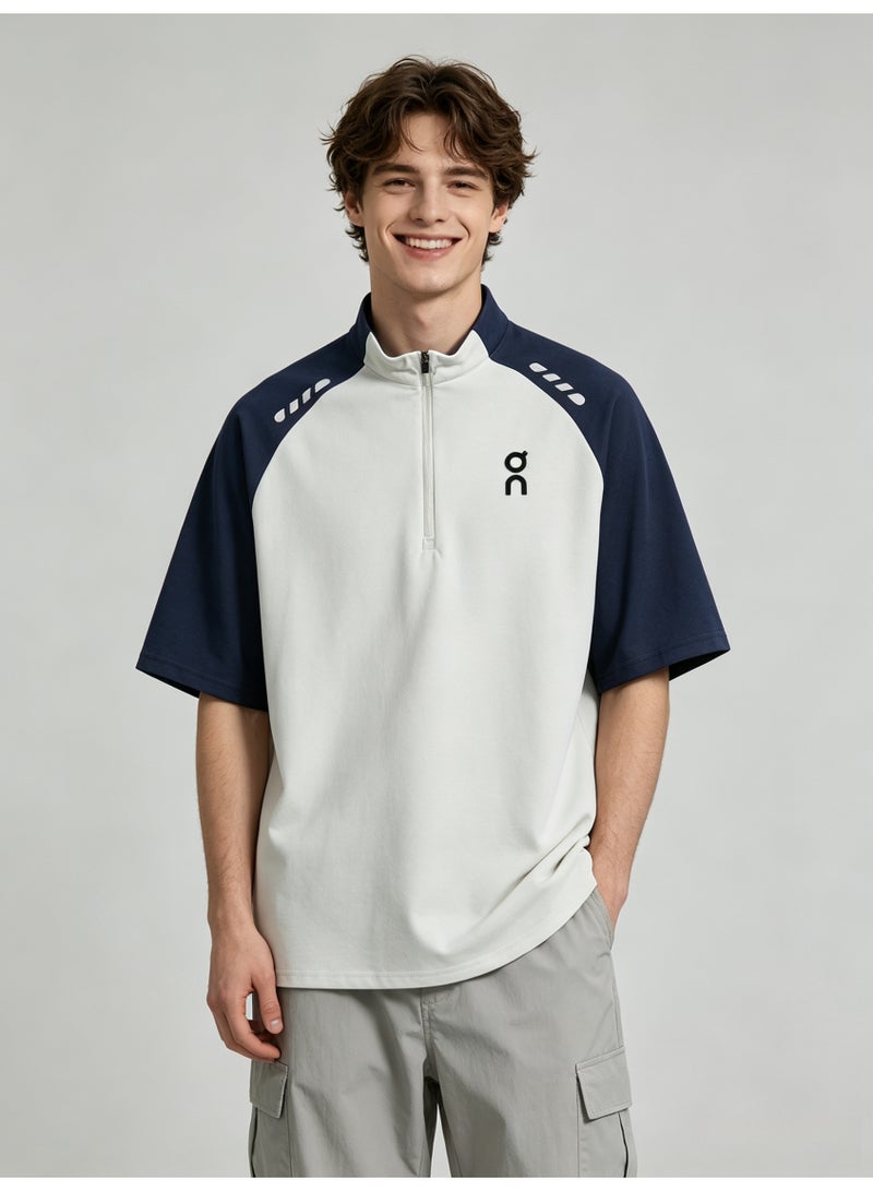 اون راننج On Running Men Half Zip Stand Collar Raglan Short Sleeve T-Shirt, White Navy Color Block Athletic Top with Logo Print - Image 1