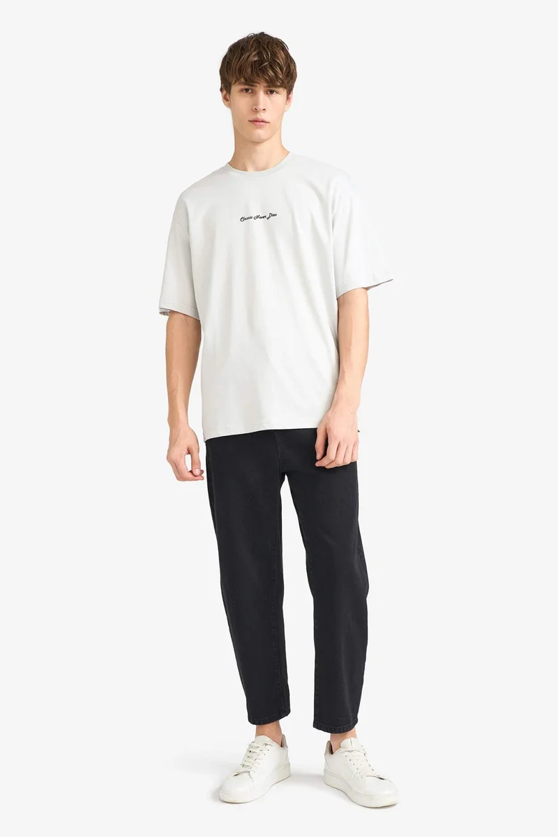 ديفاكتو Boxy Fit Crew Neck Printed Short Sleeve T-Shirt