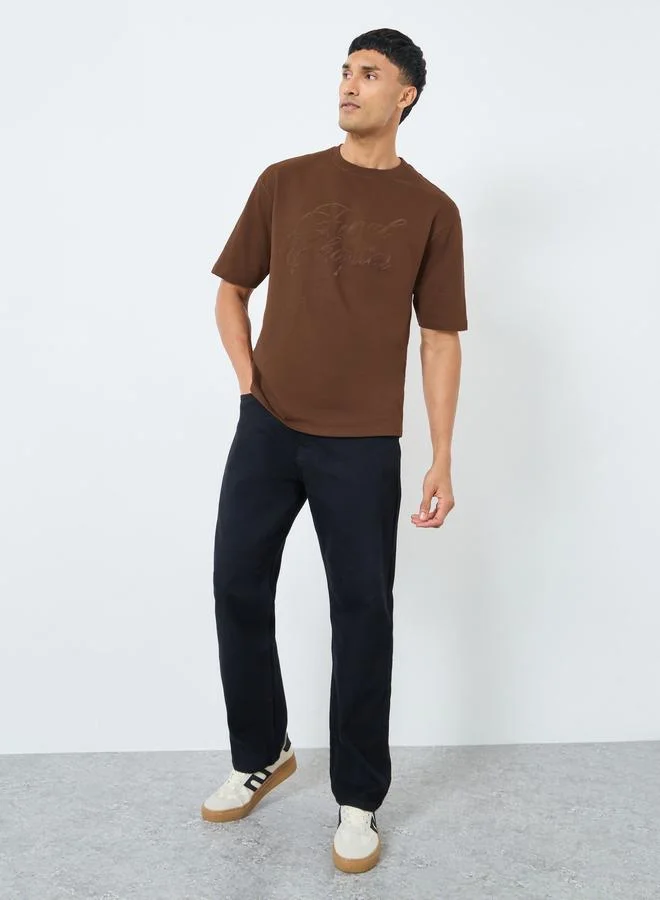Styli Styli Men Brown Oversized Flock Chest Print T-Shirt