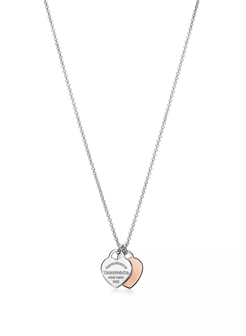 Tiffany & Co. Tiffany Double Heart Tag Pendant in Silver and Rose Gold  - Image 1