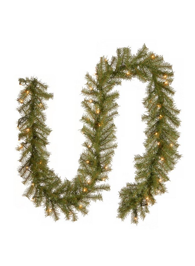 National Tree Company National Tree Company Pre-Lit Artificial Christmas Garland, Green, Norwood Fir, White Lights, Plug In, Christmas Collection, 9 Feet  - Image 1