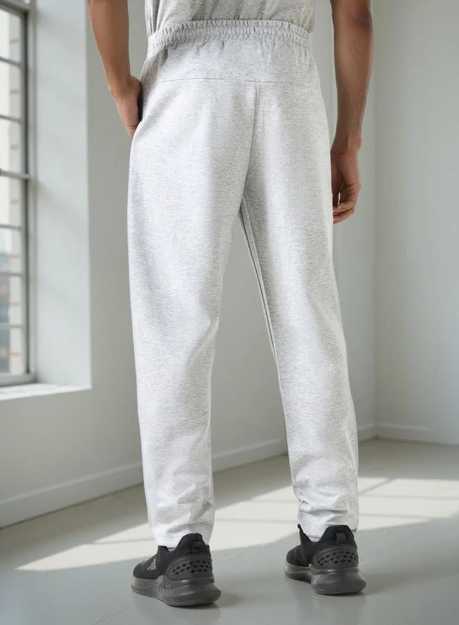 Kappa  Kappa Relaxed Fit Pants with Drawstring Closure & Pocket Detail for Men | Best Price UAE