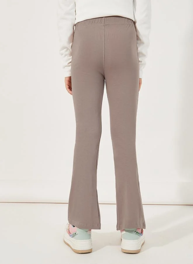 Styli Solid Flared Leggings with Split Hem