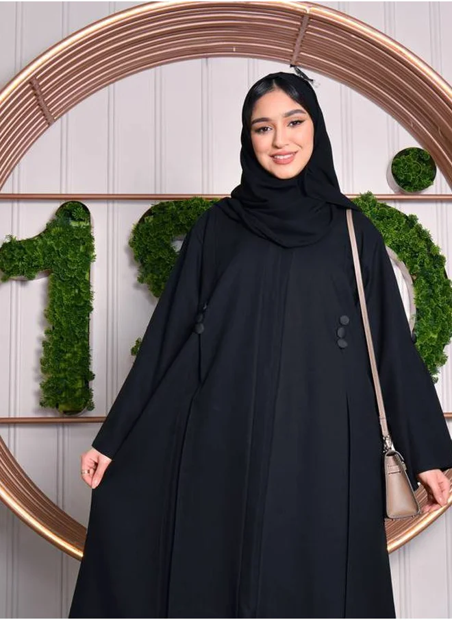 HAWRAA ABAYA Black abaya with pleats and buttons on the sleeves, front and back