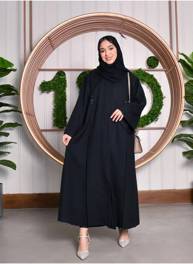 HAWRAA ABAYA Black abaya with pleats and buttons on the sleeves, front and back