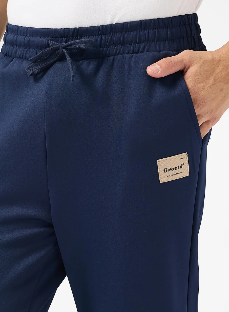 سفنتي فايف بيسيكس Relaxed Fit Emblem Joggers