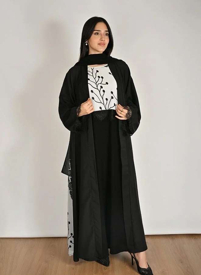 Hawraa Abaya Black Abaya with a Flowing Design and Matching Inner Dress, Adorned with Floral Prints
