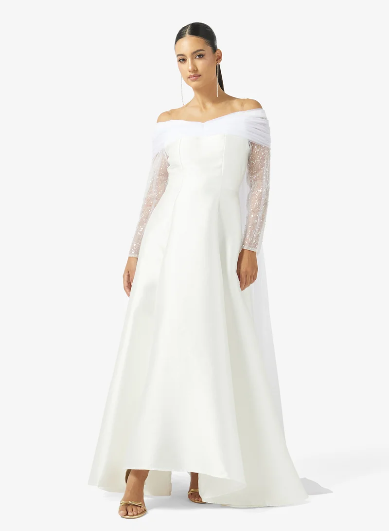 نمشي x فستان سهرة مكشوف الأكتاف بأكمام لامعة