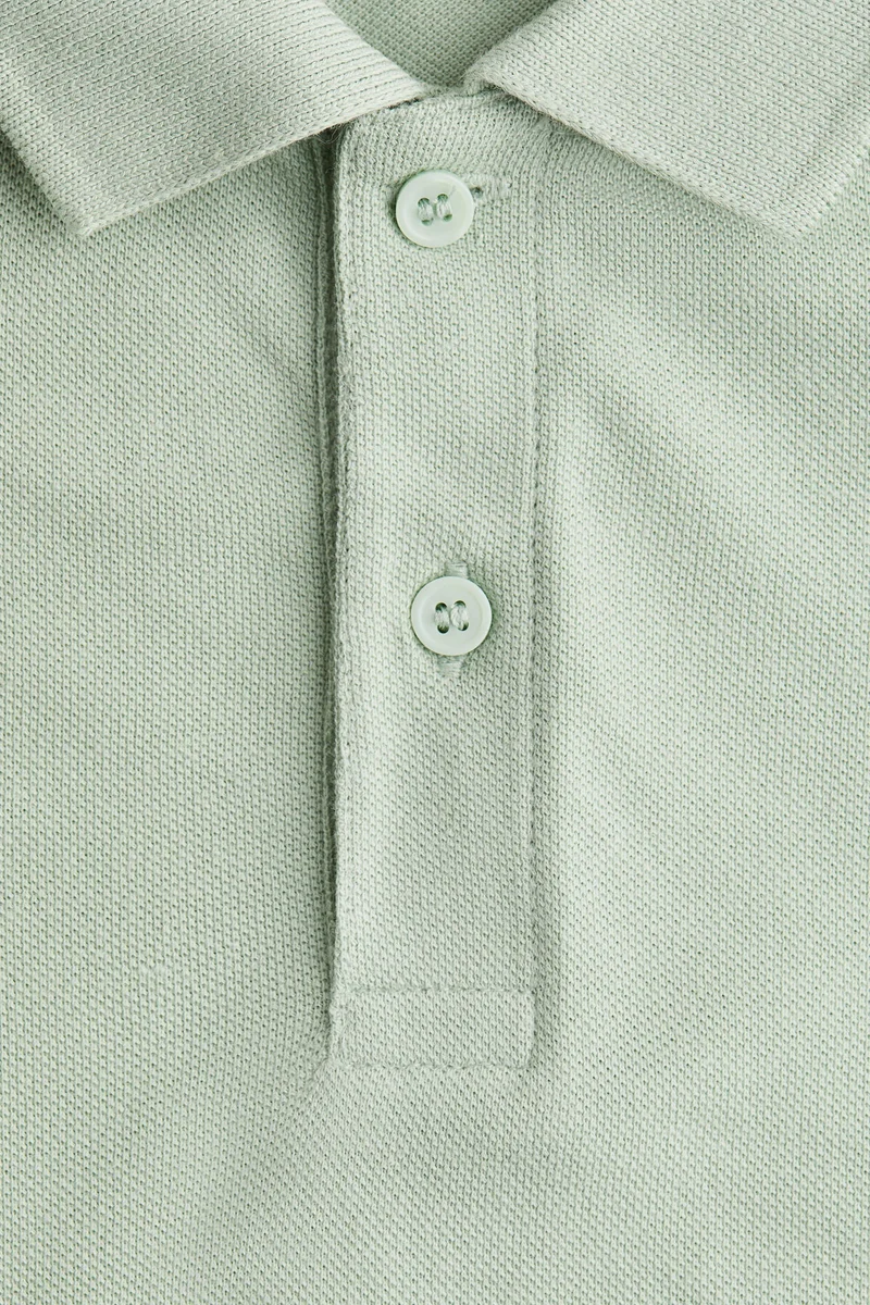 اتش اند ام تي-شيرت بولو من قطن بيكيه