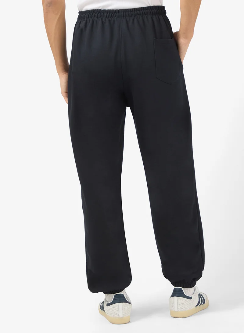 Seventy Five Basics  Graphic Print Elastic Hem Joggers for Men | Best Price UAE