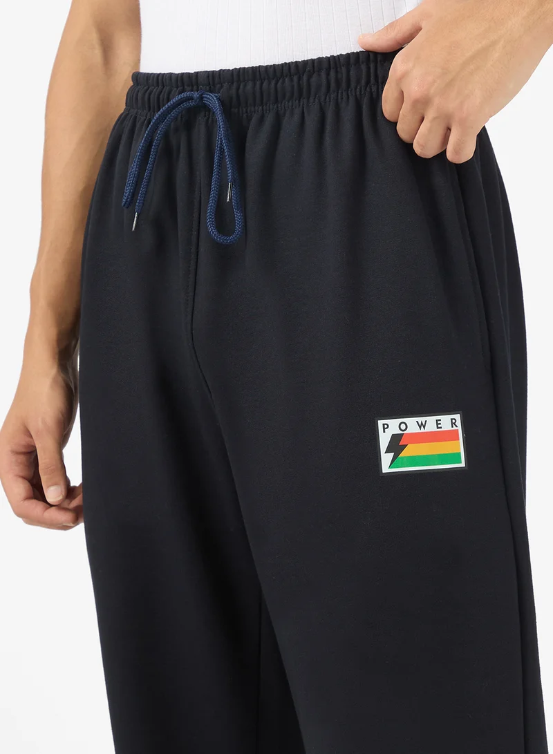 Seventy Five Basics  Graphic Print Elastic Hem Joggers for Men | Best Price UAE