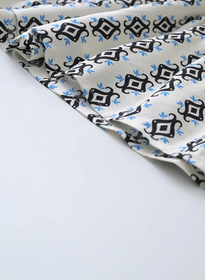 BELLA MODA BELLA MODA All-Over Print Bow Detail Dress with Long Sleeves