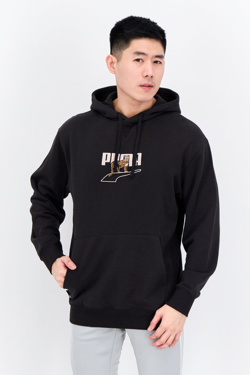 PUMA Men Sportswear Fit Long Sleeve Outdoor Hooded Sweatshirt, Black - Image 1