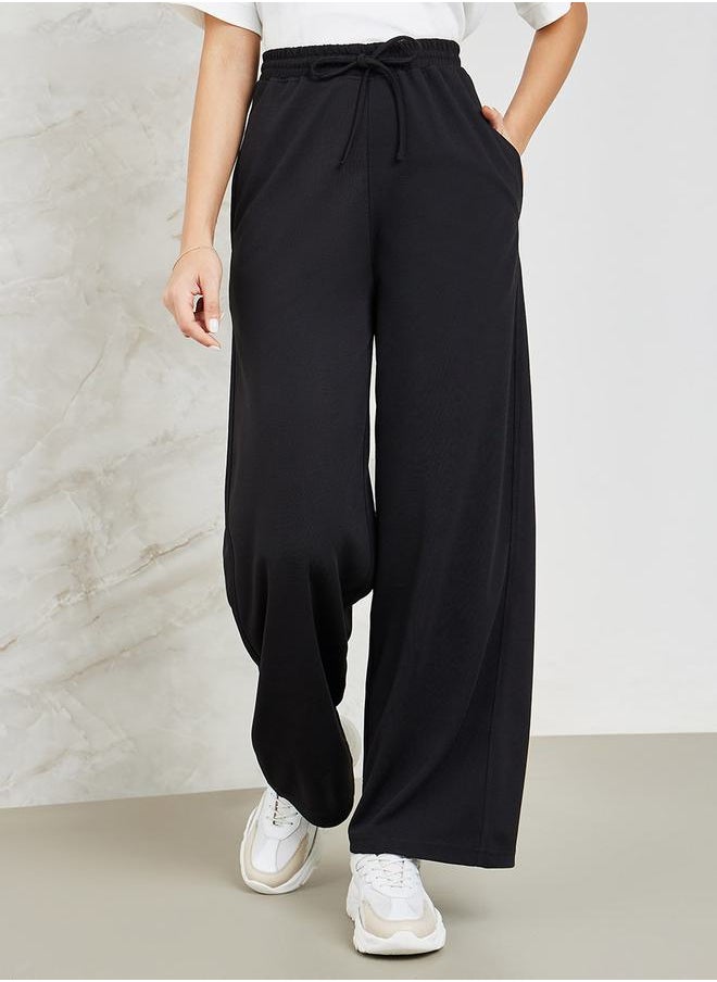 Wide Leg Jogger with Side Pocket - https://f.nooncdn.com/p/pzsku/ZE941F01FCAE126C2E11FZ/45/_/1710080104/566a7120-e872-4f5e-8ef5-0d041246b7b0.jpg?width=original